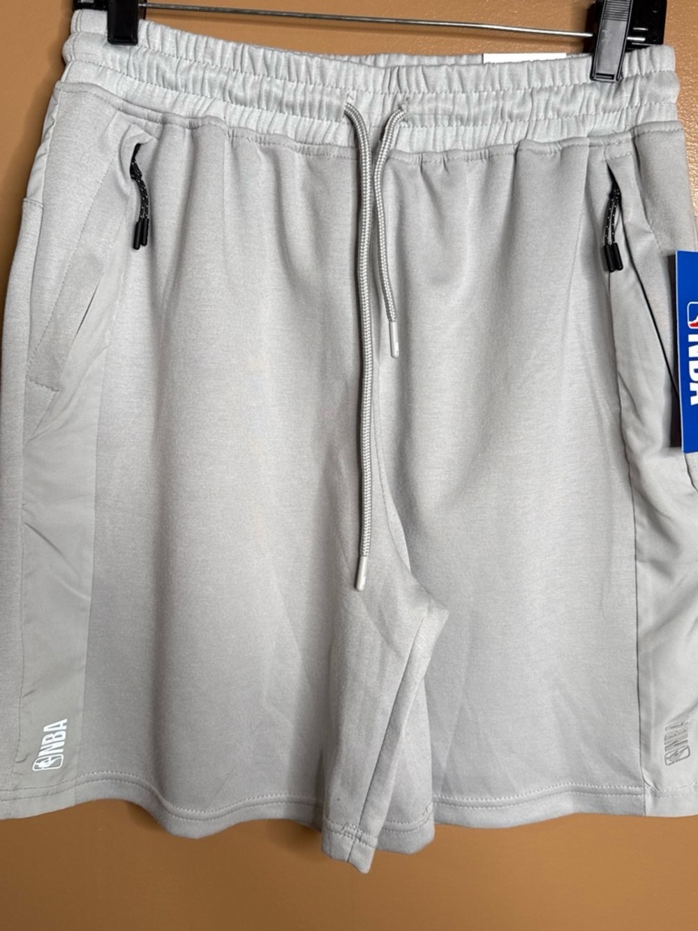 NBA Men's Light Gray Athletic Performance Shorts with Zipper Pockets